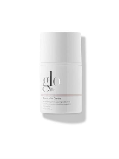 White skincare cream jar with 'glo' branding on a white background