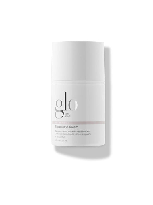 White skincare cream jar with 'glo' branding on a white background